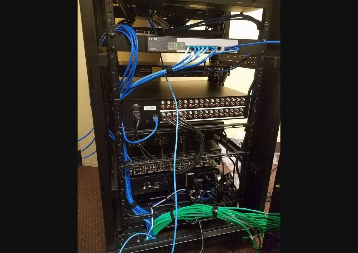 Network rack service in Houston for AV troubleshooting, smart home reliability, and system recovery.