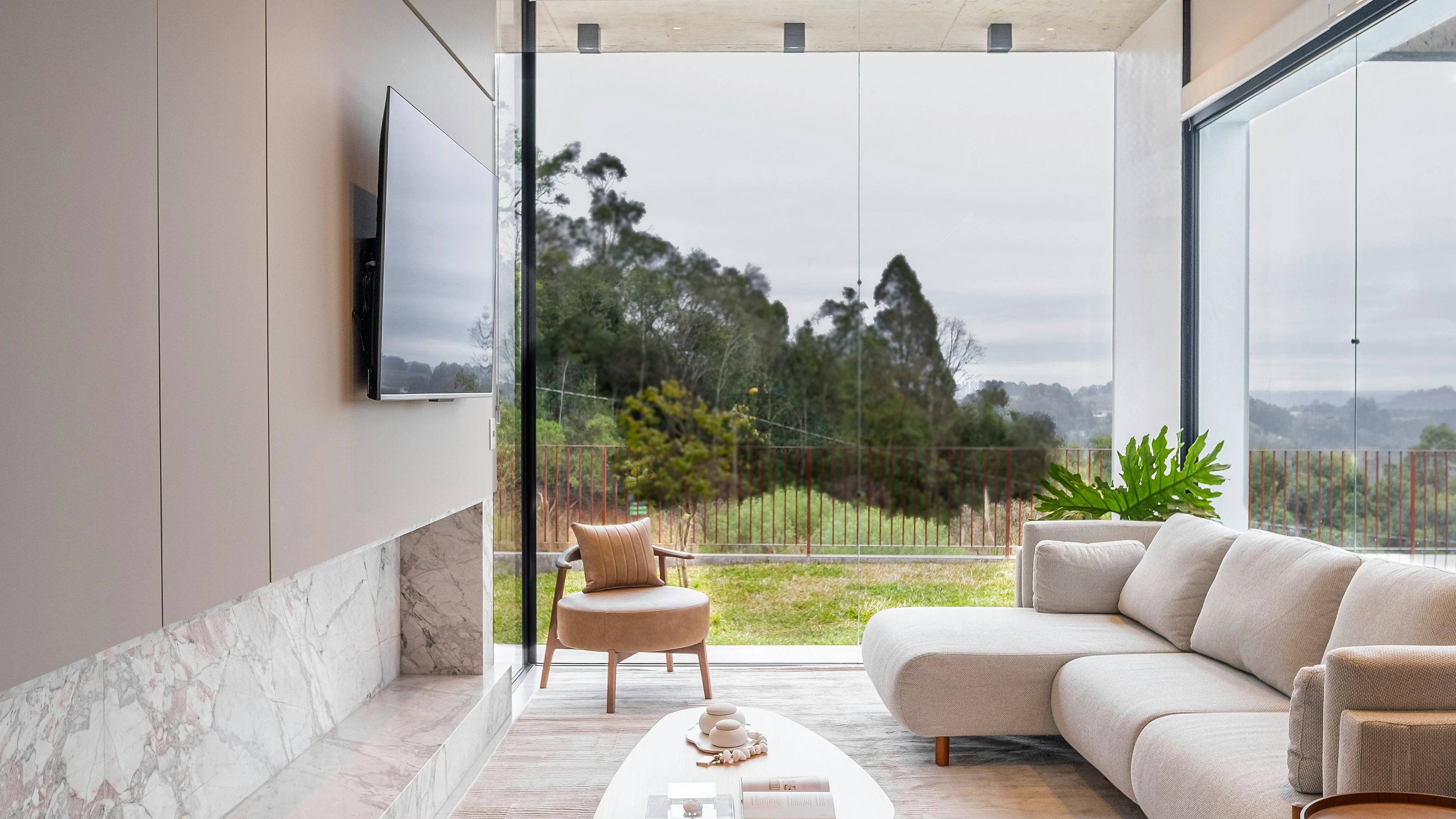 Modern living room with discreet television and integrated audio-video system