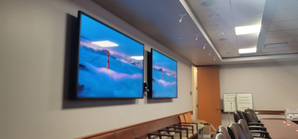 Large displays mounted in a commercial room