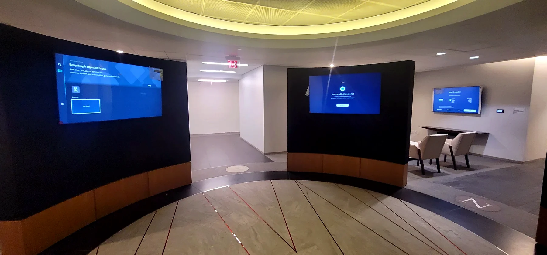 Houston commercial conference room AV installation with multiple wall displays and meeting room seating